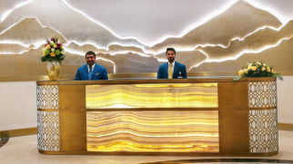 oman air first and business class lounge reception muscat airport