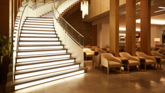 japan airlines first and business class lounge staircase tokyo narita airport